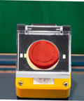 Clear protective cover on 16mm emergency stop button; part of Ten Pack Button Covers For Push Switches Emergency Stop Guards Protective Plastic Covers For Industrial Machinery 16mm Button Holes Easy Install Durable Safety Shield Keeps Your Gear Protected
