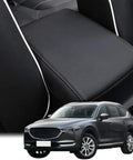 Leather Center Console Armrest Cover For Mazda CX-5 2017-2025 close-up with vehicle, black leather, fits Sport Touring Grand Touring