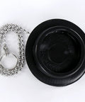 Bathtub Drain Stopper with Rubber Bath Plug featuring a black rubber design and silver chain for easy removal.