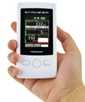 Hand holding Pocket EMF Meter With Multi Field Readout Up To 2000mG ELF RF Gauss Meter Electric Field And Electromagnetic Field Strength Tester 4 Digit LCD With Green Warning Indicator Portable And Handy
