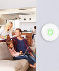Family in living room with Wave 1st Gen Radon Detector With Free App Real Time Monitoring Temp And Humidity Tracking Battery Operated