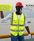 Straight Up Durable High Visibility Reflective Safety Vest With Nine Roomy Pouches Meets Ansi Isea Class 2 Standards For Night Shifts And Construction Jobs Comes In Flawless Neon Yellow Large with 9 pockets and reflective stripes.