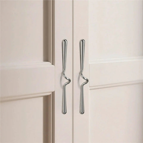 Close-up of vintage cabinet pulls 3 pack wave handles for cabinets dressers wardrobes and cupboards solid metal hardware in silver.