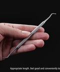 Hand holding Ingrown Toenail File And Lifter Set Double Sided Stainless Steel Pedicure Tool With Storage Case