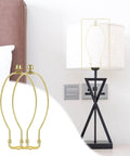 Snag These Tough 10 Inch U Shaped Lamp Harps To Secure Wobbly Table Lamps Fast Featuring Dependable Saddle Clips And Knockout Finial Caps For A Damn Nice Finish with two brass harps and a lamp.