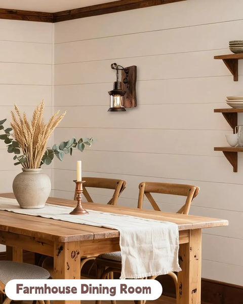 Industrial Farmhouse Wall Sconce With Rustic Wood Base And Glass Lantern Shade in a cozy farmhouse dining room setting.