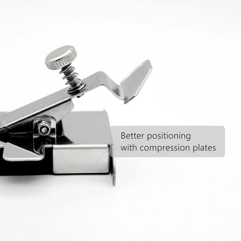 Close-up of magnetic seam guide foot for sewing machines; chrome metal with screw and spring.