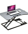 Portable Sit Stand Desk Converter With Heavy Duty Dual Tray Ergonomic Stand for laptop use, black and gray finish, height adjustable.