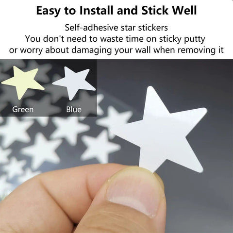 Hand holding a star from Dope Glow In The Dark Star Stickers Set With 354 Realistic Star Shapes In Three Sizes for Ceiling and Wall Decor.