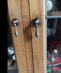 Antique Brass Cabinet Door Pulls Set 2 Pack 2.44 x 0.94 Inches Zinc Alloy Hardware on wooden cupboard doors