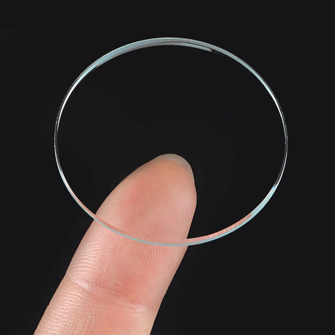 Six Pack Watch Crystal Lenses 32.5mm Diameter Round Flat Mineral Glass Replacement Parts For Watch Repair shown on fingertip