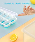 Four Pack Silicone Ice Cube Trays With Lid And Storage Bin Includes Scoop For Effortless Freezer Organization and Easy Lid Access.