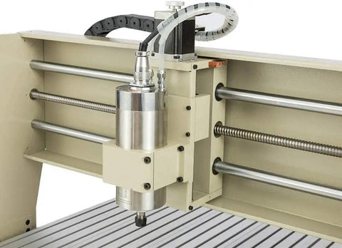 Close-up of the USB 4 Axis CNC Router Kit 6090 showing 2.2KW water-cooled spindle on the aluminum frame for engraving