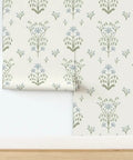 Premium Floral Meadow Wallcovering With A Subtle Matte Linen Texture Hits Different Across Every Room Built Tough For Busy Households Featuring No Sweat Paste To Paper Install showing floral pattern in green and blue.