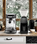 Premium Black Espresso Coffee Maker And Burr Grinder Bundle For Fresh Home Barista Brews Smooth Specialty Shots on kitchen counter.