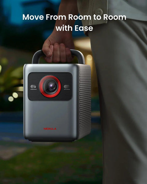 Person carrying Cosmos 4K SE Smart Projector With Dolby Vision And 200 Inch Screen 1800 ANSI Lumens HybridBeam at night