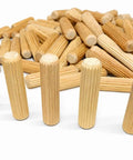 Pro Grade Fluted Birch Wood Dowel Pins 3/8 x 1-1/2 Inch, 175-Piece Joinery Set for Furniture Building shown in a pile