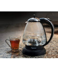 Top Notch 230V Water Kettle With Stainless Steel Dome Heater, DURAN Glass, Boil Dry Safety, Polished Chrome Finish, next to cup