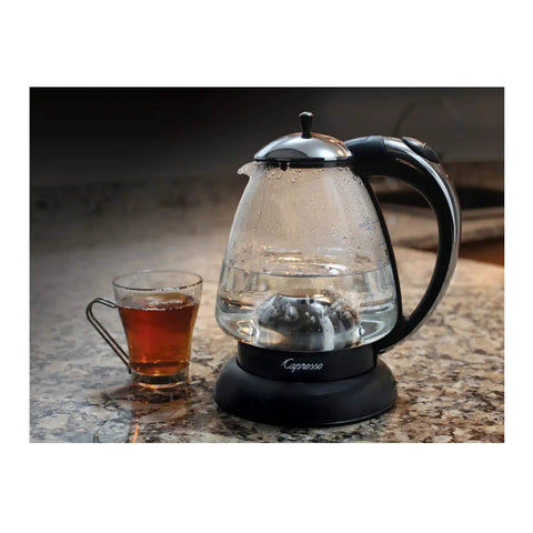 Top Notch 230V Water Kettle With Stainless Steel Dome Heater, DURAN Glass, Boil Dry Safety, Polished Chrome Finish, next to cup