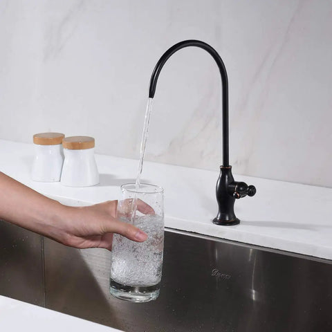 Top Shelf Stainless Steel Drinking Water Faucet For Under Sink Water Filter System Featuring Smooth Flow Non Air Gap RO Design Oil Rubbed Bronze Finish with water pouring into a glass.