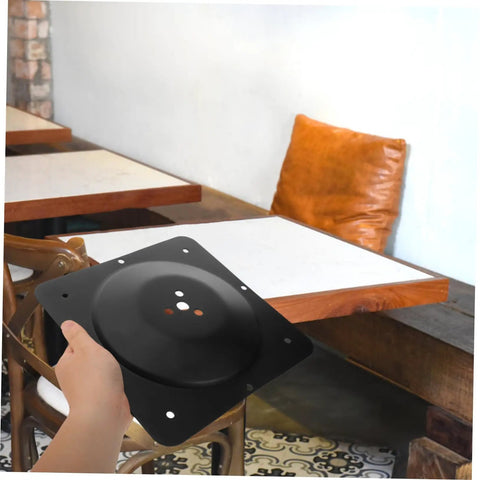 Heavy Duty Badass Table Leg Mounting Plate Multi Purpose Furniture Attachment Hardware No Sweat Install Iron Bracket Connector for wobbly leg repair DIY projects held in hand.