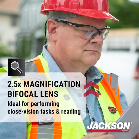 Hella Comfortable Bifocal Safety Glasses With 2.5 Magnification For Men And Women, worn by a worker reading a document.