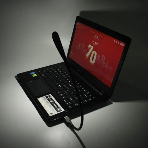 Dimmable USB Keyboard Light With Flexible Gooseneck, illuminated laptop keyboard, slim black design for reading and work, three brightness levels.