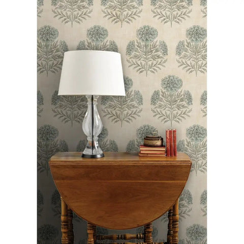 Blue Floral Vinyl Wallpaper With Subtle Leather Texture Finish Paste Required Commercial Grade Wallcovering For Hotels Offices Restaurants Custom Printed Just For You Professional Installation Recommended Solid Performance Room Decor on a beige floral patterned wall.