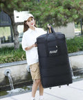 Radefasun expandable XL travel duffel bag with six wheels, black Oxford fabric