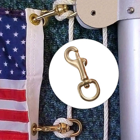 Heavy Duty Brass Flagpole Snap Clips Two Piece Set With Swivel Eyelet attached to a flag and halyard rope.