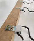 Heavy Duty Couch Spring Repair Kit With Upholstery S Clips For Zig Zag Springs, showing metal clips securing zigzag springs to wooden frame.