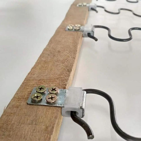 Heavy Duty Couch Spring Repair Kit With Upholstery S Clips For Zig Zag Springs, showing metal clips securing zigzag springs to wooden frame.