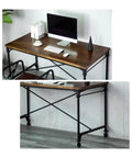 Top view of a rolling computer desk with smooth caster wheels, solid wood top, and heavy duty steel frame.