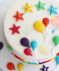 Decorated cake with colorful fondant balloons using Balloon Silicone Molds Set Of 5 For Cake Decorating And Candy Making.