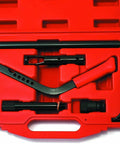 Pro Grade Overhead Valve Spring Compressor Kit For Car Engines in a red blow mold case, includes bolts and lever for head-on or off use.