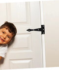 Black iron tee hinge installed on white door edge; 8-pack for cabinets and doors