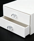 Mini Transparent Acrylic Knobs on white drawers, part of Glass Handles For Makeup Boxes Drawers And Cabinets 20 Pcs 17x20mm