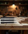 Built Like A Tank High Carbon Steel Center Punch Set 3 Piece Black Hand Tools With Sure Grip For Precise Marking And Drilling Starters On Metal Wood Alloy Steel on a workbench.