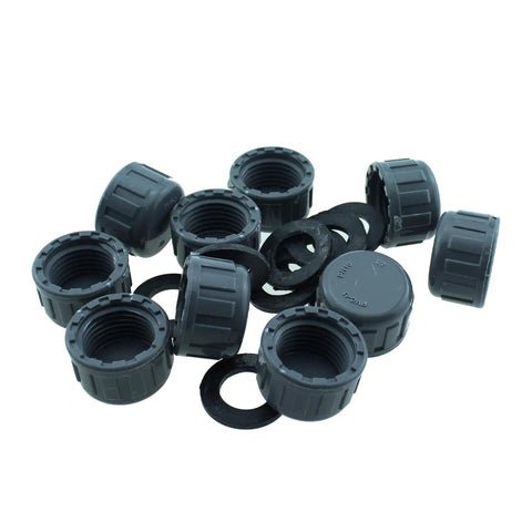 SQXBK 12-Piece 1/2 Inch PVC Inner Teeth Pipe Plugs for irrigation systems, showing a collection of black threaded end cap connectors.