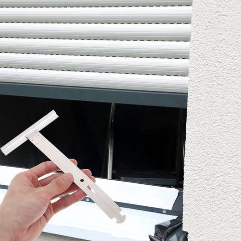 Four Piece Heavy Gauge Roller Shutter Spring Replacement Kit Built From Top Shelf Stainless Steel For Easy Peasy Window Shutter Repairs And Reliable Daily Performance, featuring repair tool and rolled shutters.