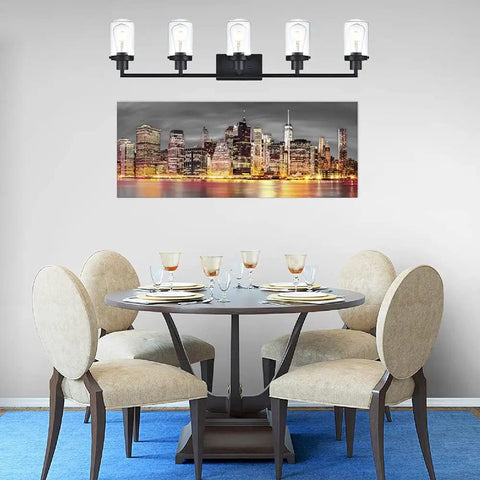 Dining area with round table, chairs, and 5-Light Vanity Lights Matte Black Finish, Farmhouse Industrial Wall Sconce With Clear Glass Shades.