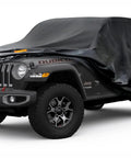 7 Layer Heavy Duty Car Cover For Jeep Wrangler 4 Door JK JL Unlimited Outdoor All Weather Waterproof Rain Sun UV Protection Frost Snowproof Inner Soft Lining Black Beefed Up Rugged Protection covering a Jeep