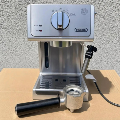 Silver 15 Bar Espresso Coffee Machine With Adjustable Brewing Controls For Homemade Cappuccinos And Lattes, front view with portafilter.