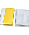 Go-To 6-Piece Survival Emergency Blanket Set with gold and silver reflective foil, folded compact, shown from above