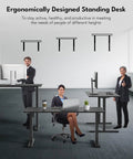 People using Electric Height Adjustable Standing Desk For Home Office Sit Stand 55 By 24 Inches with black frame and top