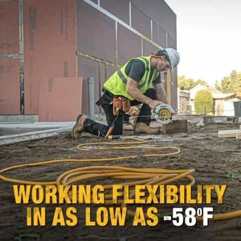 Construction worker using 25 Foot Lighted Extension Cord With Click To Lock End 10 3 SJTW Heavy Duty Cable in cold conditions