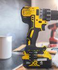 Cordless drill with Magnetic One Quarter Inch Hex Bit Holder For Cordless Drills With Four Strong Magnets Quick Access Drill Bit Holster Organizer on side.