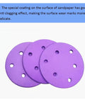 3 purple 5 inch 6Hole Alumina Sanding Discs With Super Sticky Hook And Loop Backing Ceramic Abrasive Pads for use on wood.