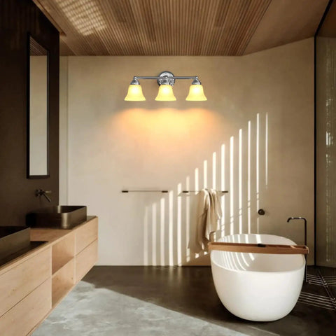 Dope Three Light Chrome Vanity Light Fixture With Frosted Glass Shades in a modern bathroom setting over a bathtub