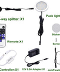 Dimmable Under Cabinet LED Puck Lights Kit With RF Remote For Your Home Kitchen Counter Lighting 3 Lamps, accessories shown.